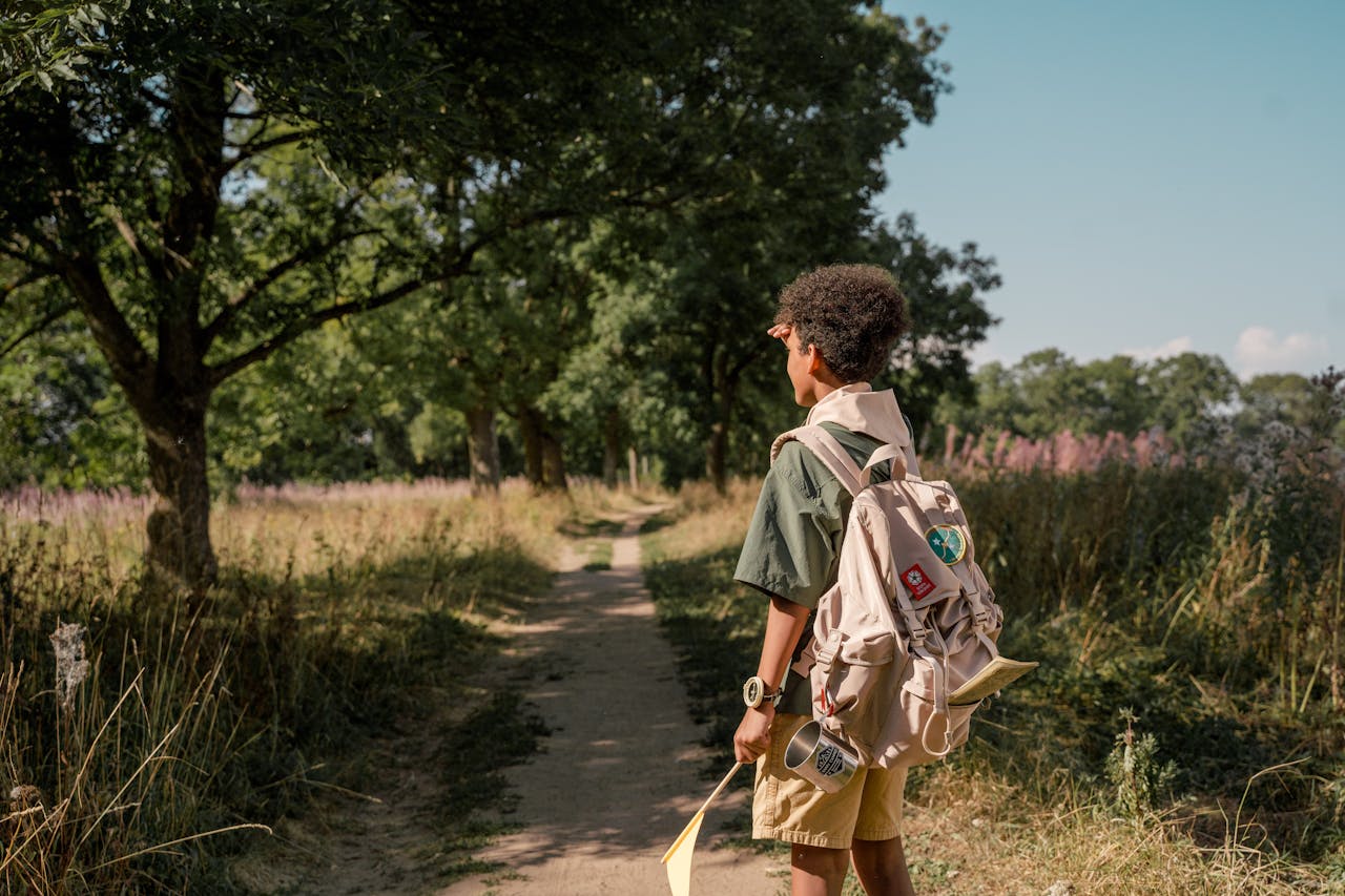 A boy scout looking ahead