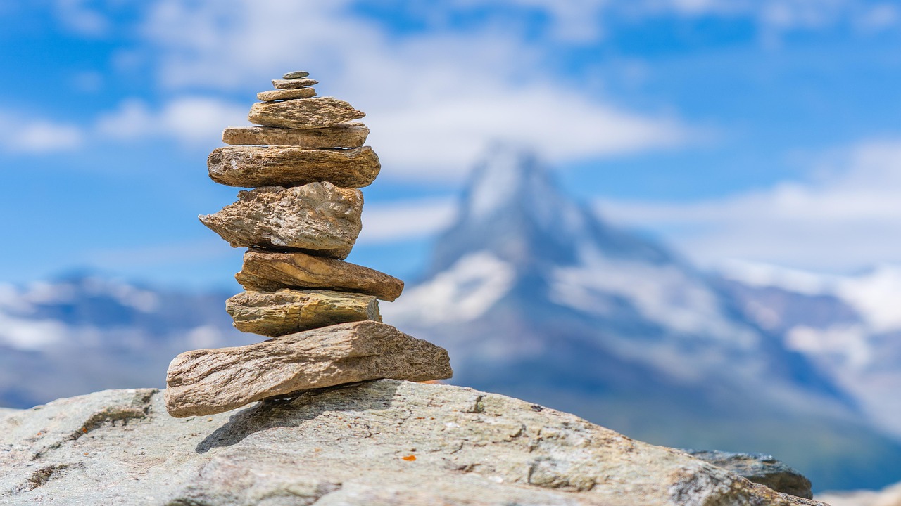 A stack of stones composing a structure. /posts/full_stack_apps/header-image.jpg